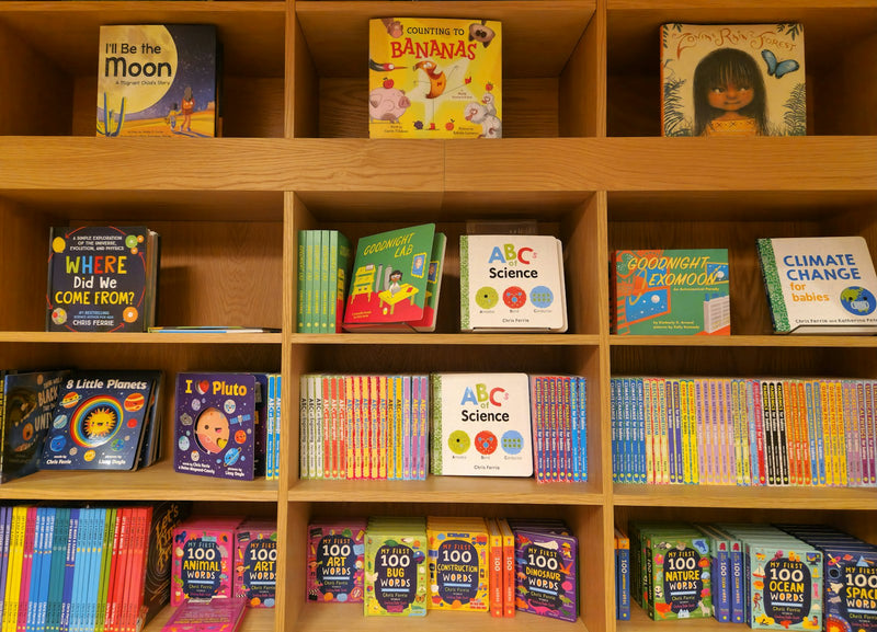 A bookshelf filled with rows of children's books